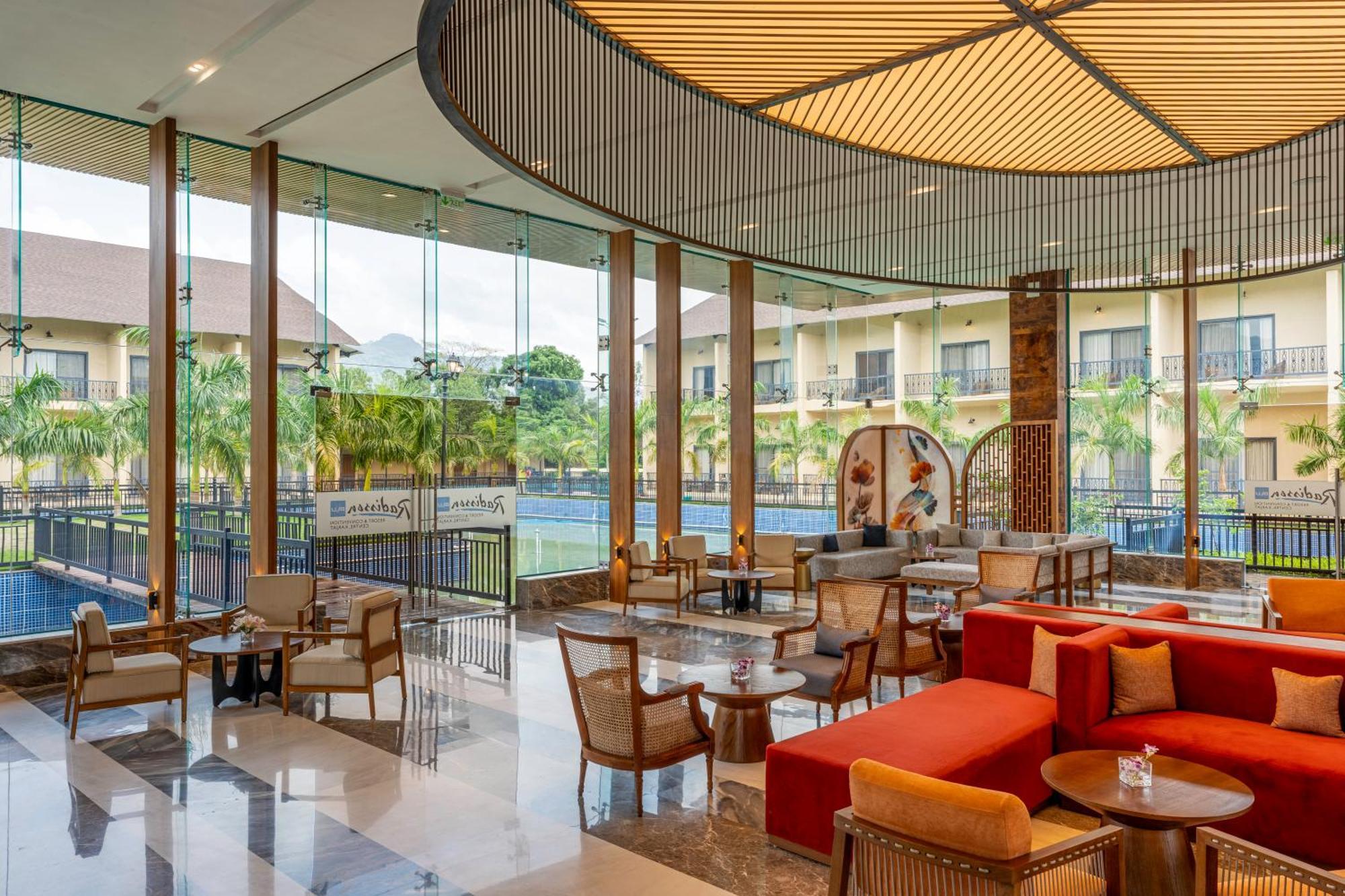 Radisson Blu Plaza Resort & Convention Centre Карджат Екстериор снимка The lobby of the hotel
